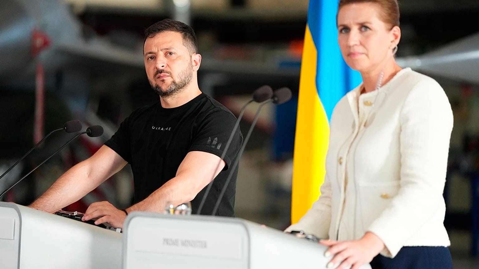Ukrainian President Volodymyr Zelenskyy, left and Denmark's Prime Minister Mette Frederiksen hold a press conference, at Skrydstrup Airbase, in Vojens, Denmark, Sunday, Aug.20