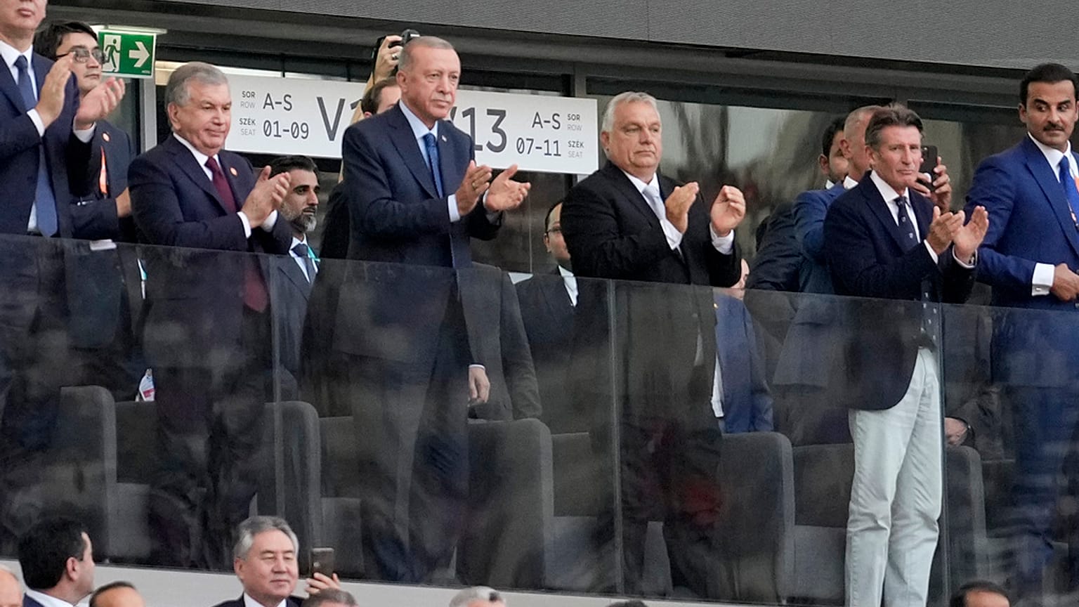 Hungarian Prime Minister Viktor Orbán (r) and Turkish President Recep Tayyip Erdogan,  applaud while attending the World Athletics Championships in Budapest, Hungary.