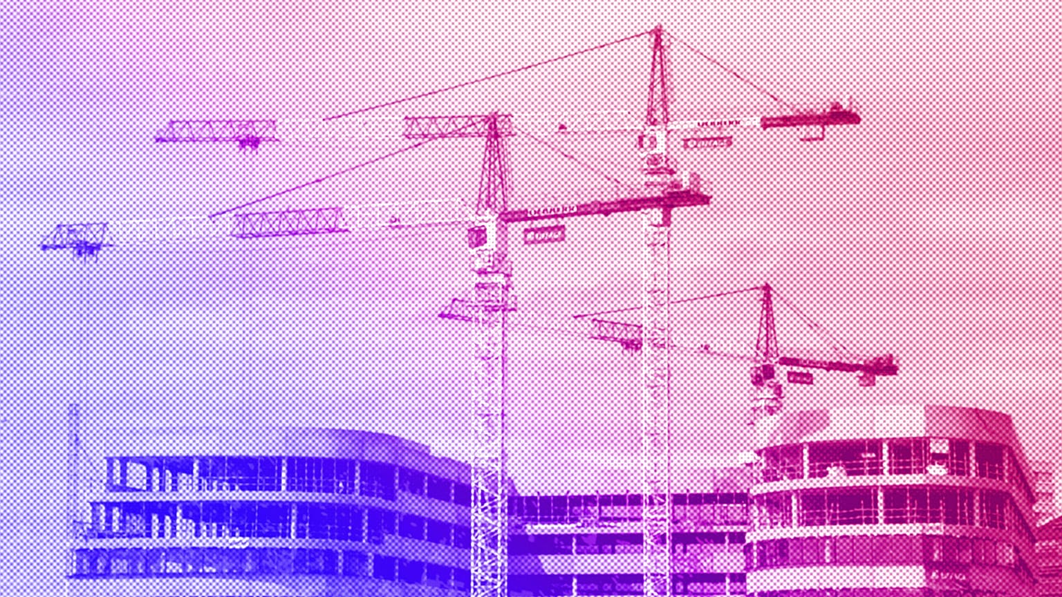 Cranes are viewed on a construction site of a new business building in Bezon, west of Paris, September 2020