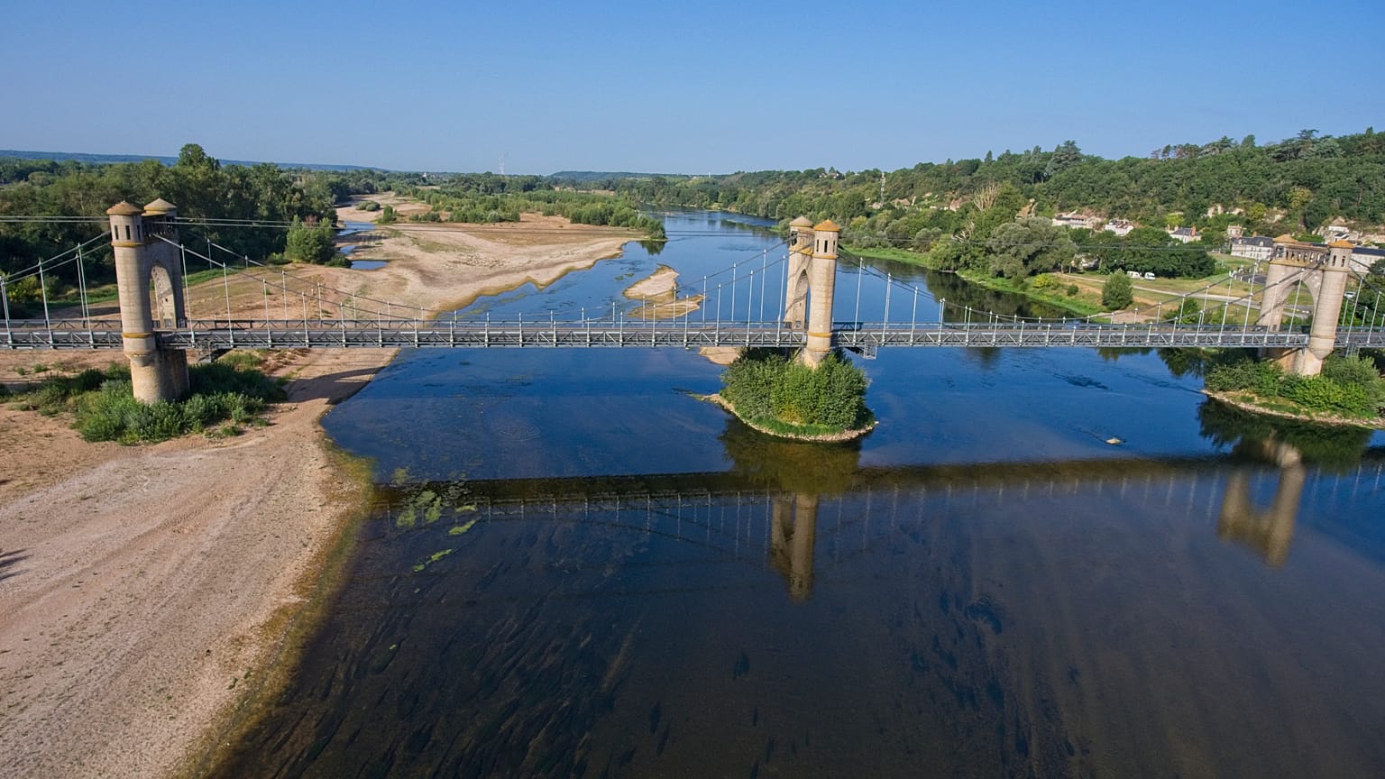Sand banks are seen on the Loire river during the drought in Langeais, central France, on August 22, 2023. France has been stepping up hot weather protection measures.