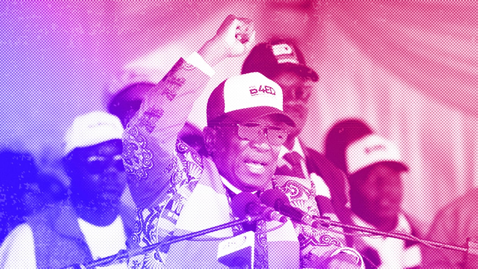 Zimbabwean President Emmerson Mnangagwa greets party supporters at a campaign rally in Harare, August 2023