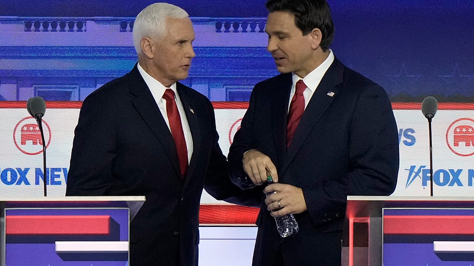 Republican primary candidates Mike Pence and Ron DeSantis at the first televised debate in Milwaukee, Wisconsin, on 23 August 2023.