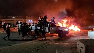 Libyans burn tyres as they protest in Tripoli 