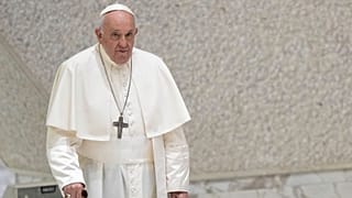 Pope Francis arrives for his weekly general audience in the Pope Paul VI hall at the Vatican on Wednesday.