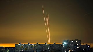 FILE - Four Russian rockets launched against Ukraine from Russia's Belgorod region are seen at dawn in Kharkiv, Ukraine, late Thursday, Feb. 16, 2023. 