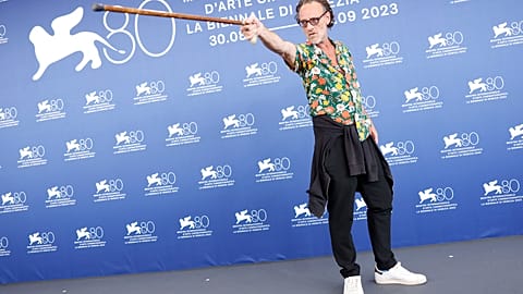 Massimiliano Rossi poses for photographers during the photo call for the film 'Comandante' during the 80th edition of the Venice Film Festival in Venice, Italy,