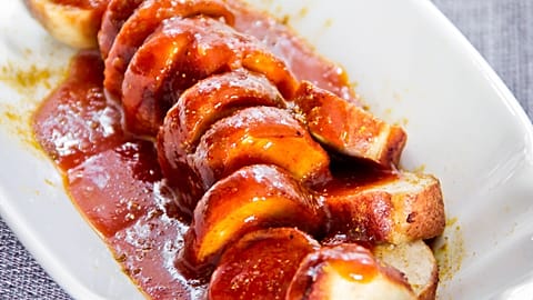 Currywurst, a famous fast food in Germany that features sliced sausage slathered in curry ketchup. 