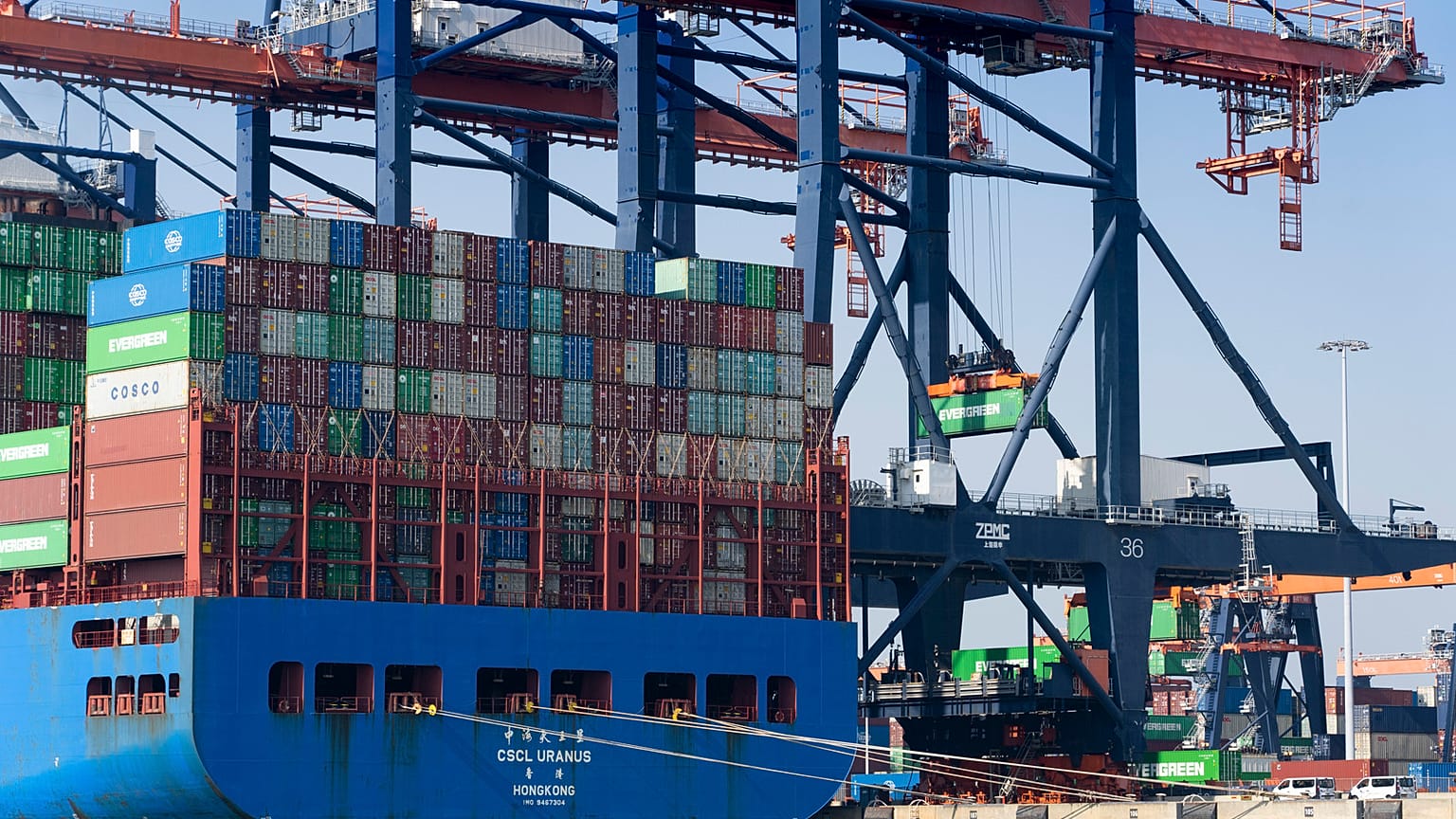 Containers are being moved in the harbor of Rotterdam, Netherlands, Wednesday, March 23, 2022. 