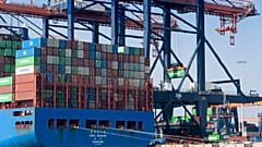 Containers are being moved in the harbor of Rotterdam, Netherlands, Wednesday, March 23, 2022. 