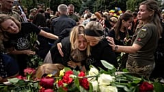 Relatives bid their last farewell to the fallen Ukrainian pilots and crew members of mi-8 military helicopters of the 18 aviation brigade in Poltava