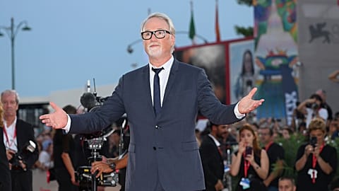 Director David Fincher arrives on the red carpet for his movie 'The Killer' in competition at the 80th edition of the Venice Film Festival at the Venice Lido, Italy, Sunday.
