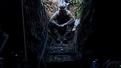 Украинский военный в укрытии близ Бахмута