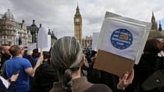 Demonstrators gather in Parliament Square before a group of EU citizens of several nationalities protest over their right to remain in the UK in 2017, the year after the vote