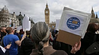 Demonstrators gather in Parliament Square before a group of EU citizens of several nationalities protest over their right to remain in the UK in 2017, the year after the vote