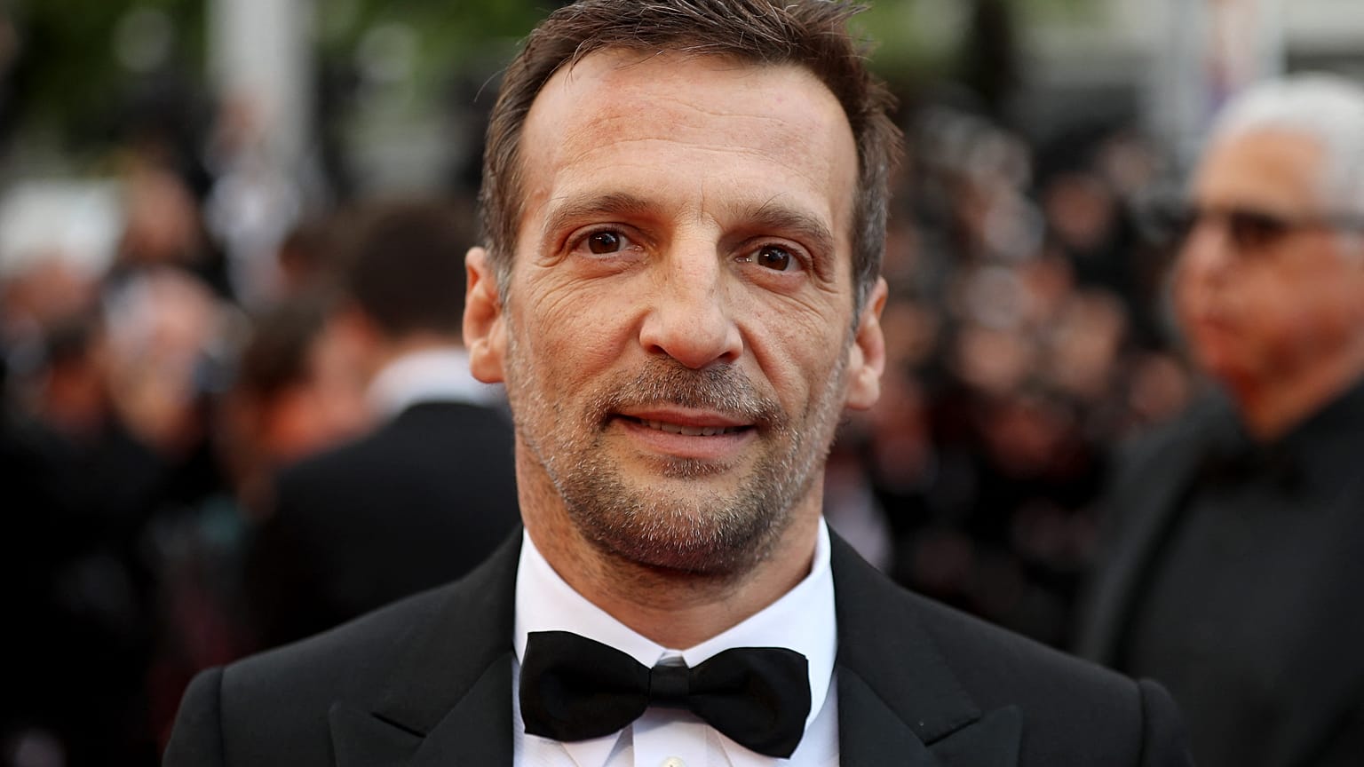 Mathieu Kassovitz arrives for the screening of the film "A Hidden Life" at the 72nd edition of the Cannes Film Festival in Cannes, southern France, on May 19, 2019. 