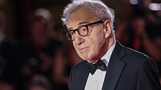 Director Woody Allen poses for photographers upon arrival for the premiere of the film 'Coup de Chance' during the 80th edition of the Venice Film Festival in Venice, Italy.