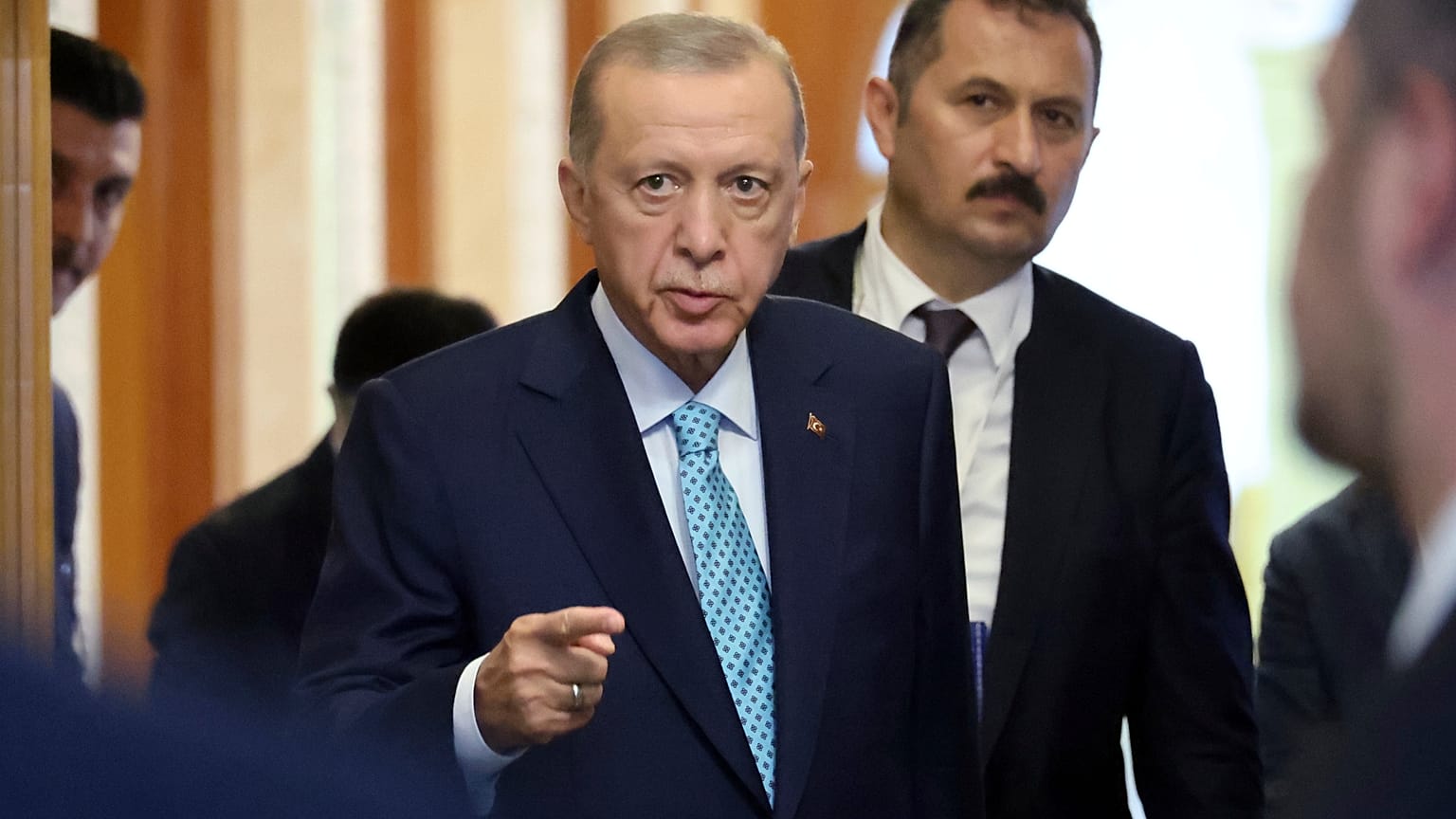 Turkish President Recep Tayyip Erdogan leaves a hall after his talks with Russian President Vladimir Putin at Russia's Black Sea resort of Sochi, Russia, Monday, Sept. 4, 2023