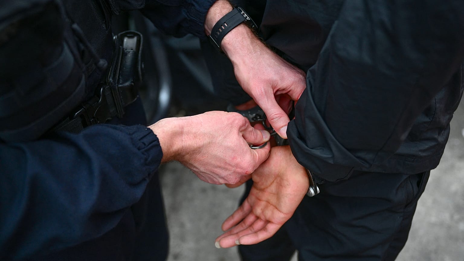 A young person is released after control by a policemen at the "Paternelle" neighborhood in the northern district of Marseille on March 31.