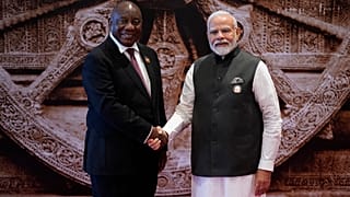 Indian Prime Minister Narendra Modi welcomes South Africa President Cyril Ramaphosa upon his arrival at Bharat Mandapam convention center for the G20 Summit, in New Delhi.
