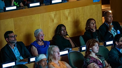 Daisy Veerasingham, president and CEO of Ap and AP Senior Vice President and Executive Editor Julie Pace watch the doc at the UN headquarters