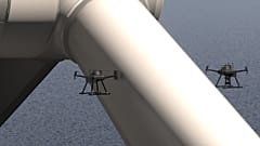 A SpectX autonomous drone inspects a wind park.