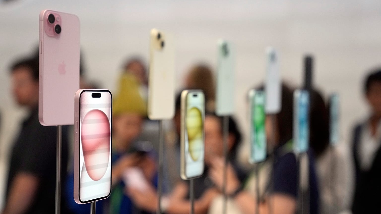 iPhone 15 and 15 Plus models are displayed during an announcement of new products on the Apple campus Tuesday, September 12, 2023