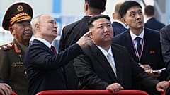 Russian President Vladimir Putin and North Korea's leader Kim Jong Un examine a launch pad during their meeting at the Vostochny cosmodrome outside the city of Tsiolkovsky.