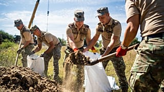 Romanian Army soldiers build a bomb shelter in the village of Plauru, Danube Delta, 300kms east of Bucharest, Romania, on September 12, 2023.