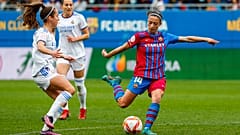 Barcelona's Aitana Bonamati, right, shoots the ball next to Real Madrid's Maite Oroz during the Women's Spanish La Liga soccer match between FC Barcelona and Real Madrid in Ba