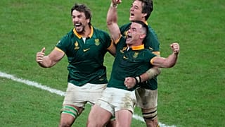South Africa players celebrate at the end of the Rugby World Cup final match between New Zealand and South Africa at the Stade de France in Saint-Denis, near Paris Saturday, O