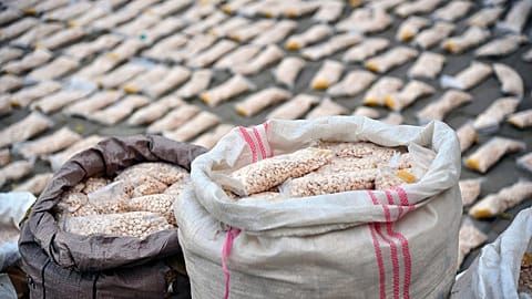 FILE - In this photo released by the Syrian official news agency SANA, Syrian authorities display Captagon pills, in rural Damascus, Syria, Tuesday, Nov. 30, 2021.