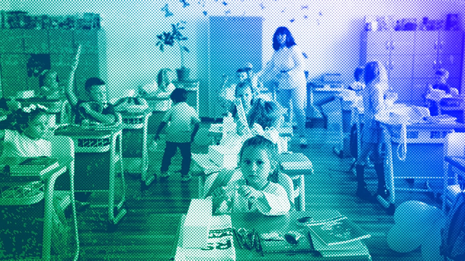 Ukrainian refugee children sit in a classroom at the Ienachita Vacarescu Elementary School after a ceremony for the beginning of the school year in Bucharest, September 2022