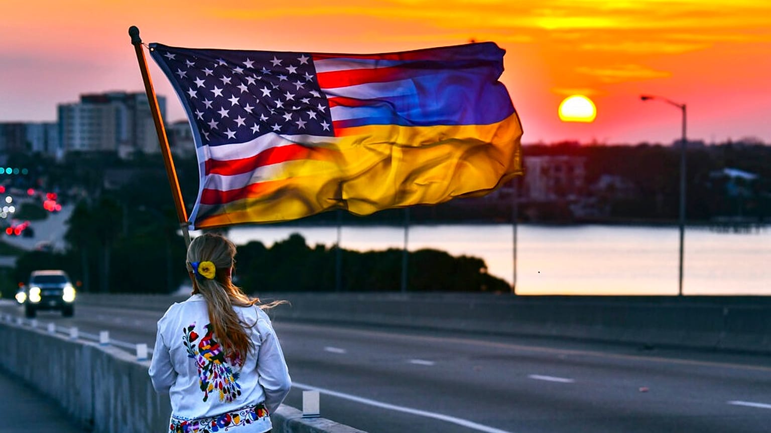 FILE - An American-Ukraine flag near the end of a march in the US marking the one-year anniversary of Russia invading Ukraine, late Thursday afternoon, Feb. 23, 2022.