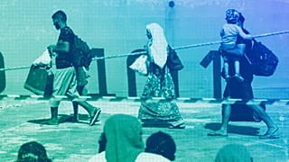 Migrants wait to be transferred from the Lampedusa Island to the mainland, 15 September 2023