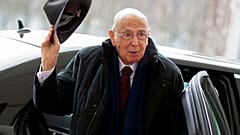 FILE - In this Feb. 28, 2013 file photo Italian President Giorgio Napolitano arrives for a meeting with German Chancellor Angela Merkel at the chancellery in Berlin, Germany