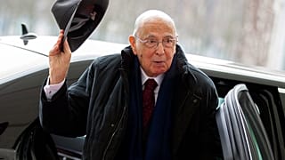 FILE - In this Feb. 28, 2013 file photo Italian President Giorgio Napolitano arrives for a meeting with German Chancellor Angela Merkel at the chancellery in Berlin, Germany