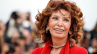 Italian actress Sophia Loren smiles during a photo call for "Human Voice," (Voce Umana) at the 67th Cannes Film Festival in 2014.