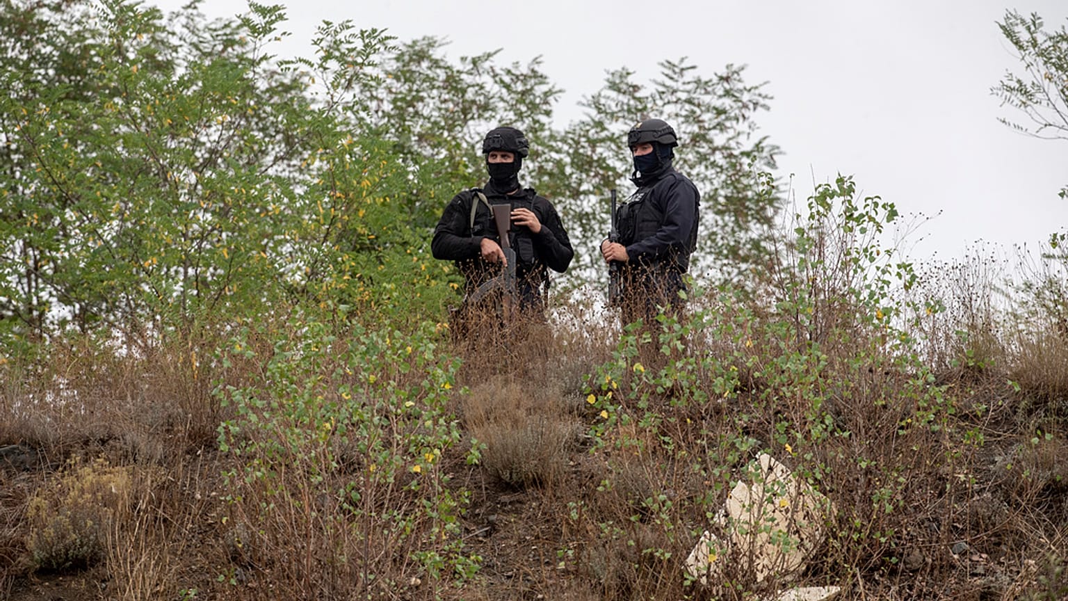Kosovo police officers patrol an area near Banjska Monastery during a ongoing police operation in the village of Banjska on Monday, Sept. 25, 2023. 