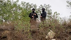 Kosovo police officers patrol an area near Banjska Monastery during a ongoing police operation in the village of Banjska on Monday, Sept. 25, 2023. 