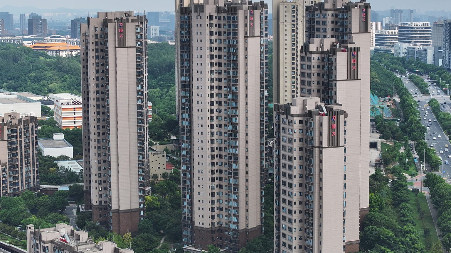 The Evergrande logo is seen on residential buildings in Nanjing, in China’s eastern Jiangsu province on August 18, 2023.