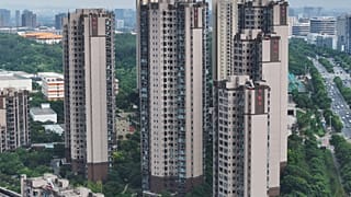 The Evergrande logo is seen on residential buildings in Nanjing, in China’s eastern Jiangsu province on August 18, 2023.