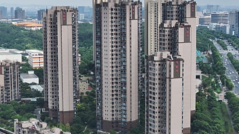 The Evergrande logo is seen on residential buildings in Nanjing, in China’s eastern Jiangsu province on August 18, 2023.