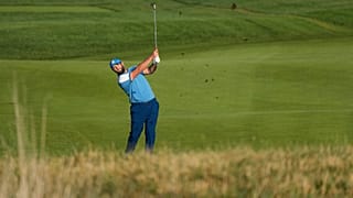 Europe's Jon Rahm play his shot at the Ryder Cup golf tournament at the Marco Simone Golf Club in Guidonia Montecelio, Italy, Friday, Sept. 29, 2023.