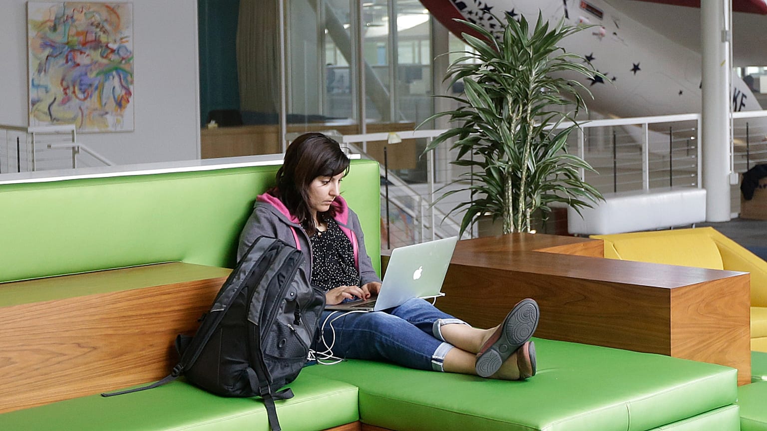 A Google employee works on her computer at a Google campus building in Mountain View, California, 2013.