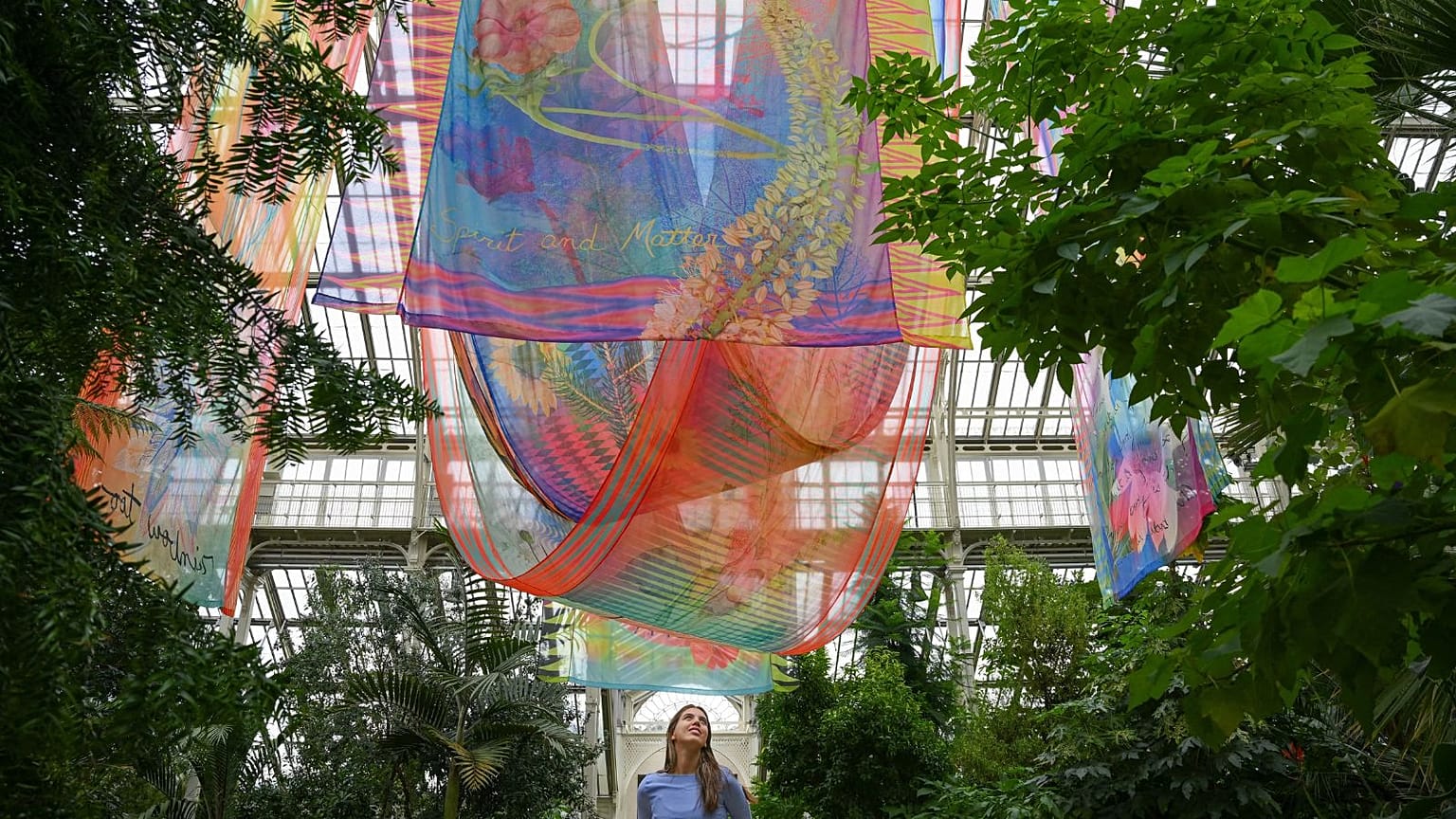 A garden employee poses for a picture for Kew Gardens' 'Queer Nature' autumn festival.