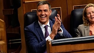 Acting Prime Minister Pedro Sanchez applauds at the Spanish parliament's lower house in Madrid