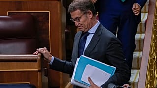 The leader of Spain's conservatives Alberto Feijoo leaves an investiture session at the Spanish parliament in Madrid, Spain.
