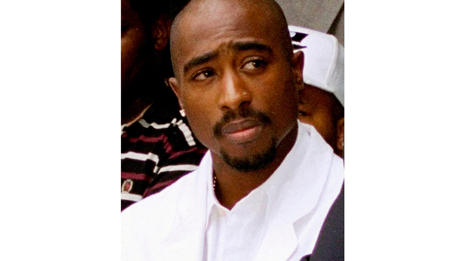 Rapper Tupac Shakur attends a voter registration event in South Central Los Angeles, Aug. 15, 1996. 