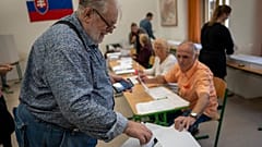 A voter casts his ballot at a polling station in Bratislava, Slovakia, Saturday, Sept. 30, 2023.