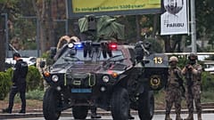 Members of Turkish Police Special Forces secure the area near the Interior Ministry following the bomb attack in Ankara